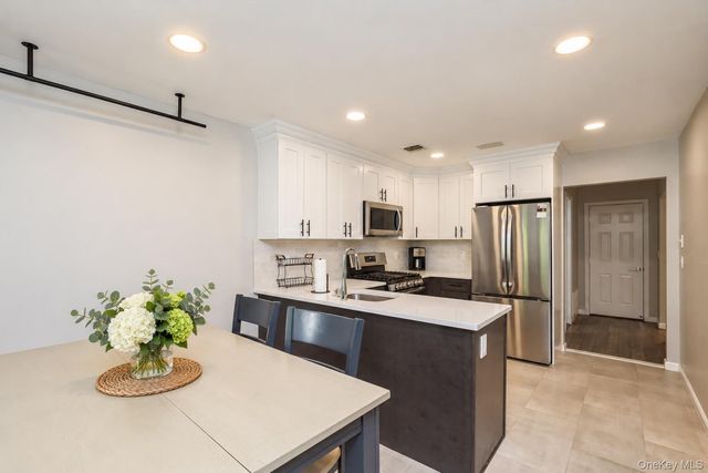 3 Plantation Drive, Hauppauge, NY 11788