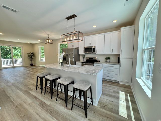1673 Carriage Ln., Little River, SC 29566