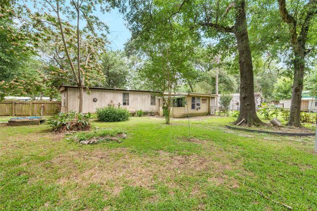 402 Baltzell Drive, Pinehurst, TX 77362