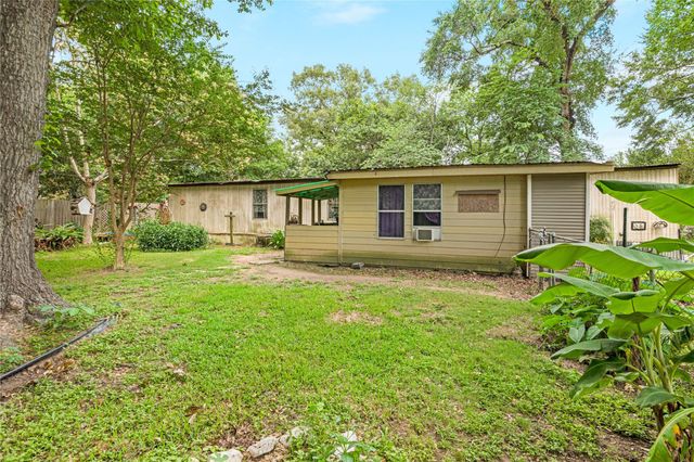 402 Baltzell Drive, Pinehurst, TX 77362