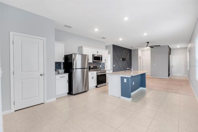 8716 SPORTSMAN LOOP, Groveland, FL 34736