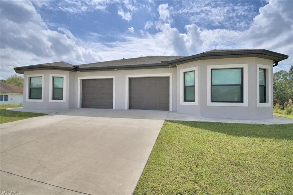 713/715 W 12th ST, LEHIGH ACRES, FL 33972 — photo 2