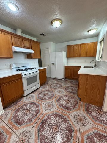 2209 Rockbluff Drive, Rowlett, TX 75088
