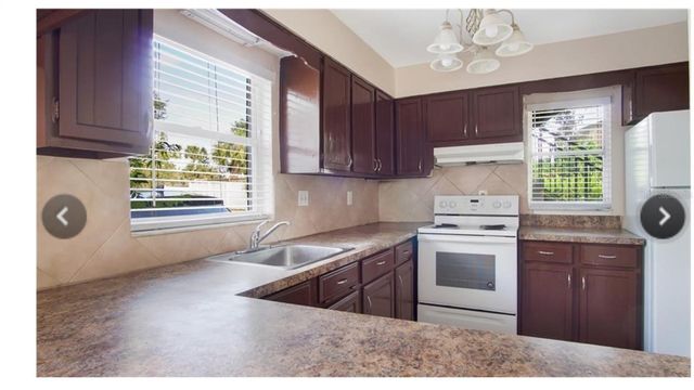6010 AMBERLY AVENUE F, Orlando, FL 32822