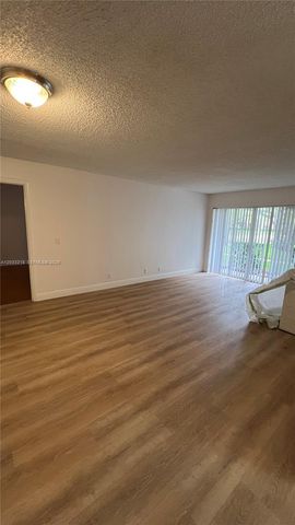8851 Wiles Road 108, Coral Springs, FL 33067