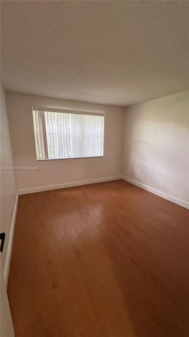 8851 Wiles Road 108, Coral Springs, FL 33067