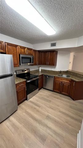 8851 Wiles Road 108, Coral Springs, FL 33067
