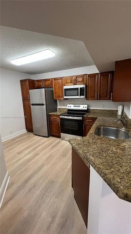 8851 Wiles Road 108, Coral Springs, FL 33067