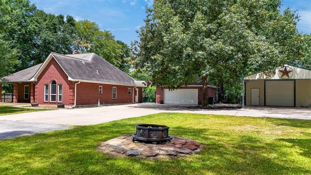 822 Sentinel Oaks, Pinehurst, TX 77362