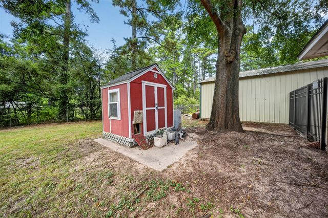 822 Sentinel Oaks, Pinehurst, TX 77362