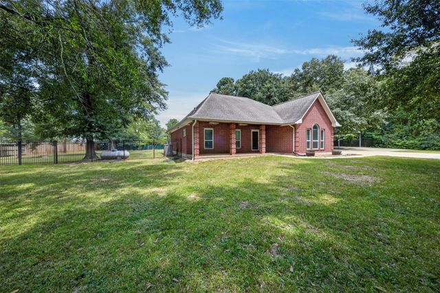 822 Sentinel Oaks, Pinehurst, TX 77362