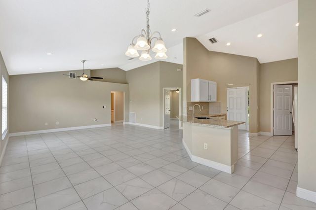 1897 SW Lofgren Avenue, Port St Lucie, FL 34953