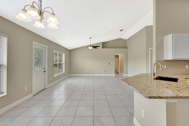 1897 SW Lofgren Avenue, Port St Lucie, FL 34953