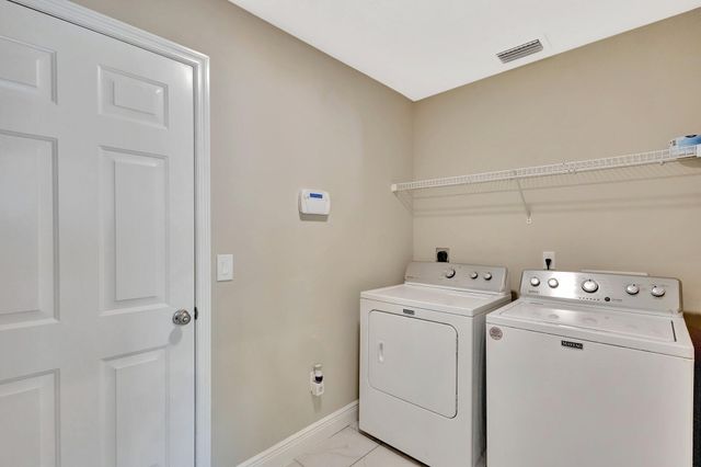 1897 SW Lofgren Avenue, Port St Lucie, FL 34953