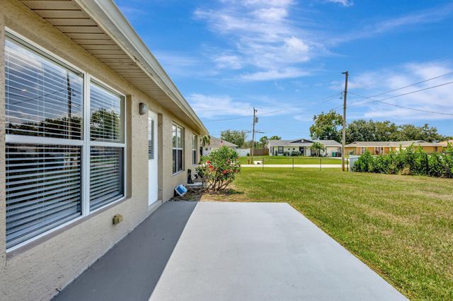 1897 SW Lofgren Avenue, Port St Lucie, FL 34953