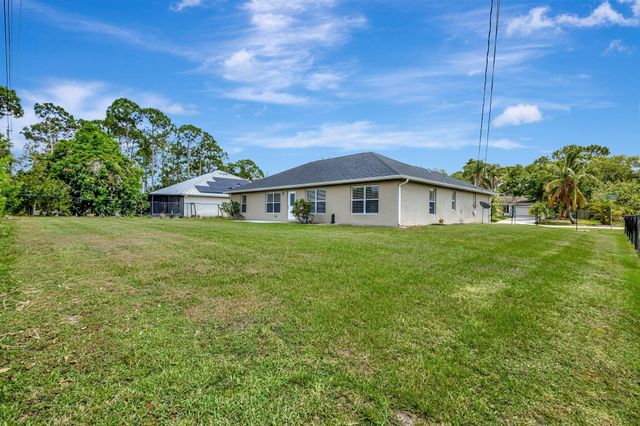 1897 SW Lofgren Avenue, Port St Lucie, FL 34953