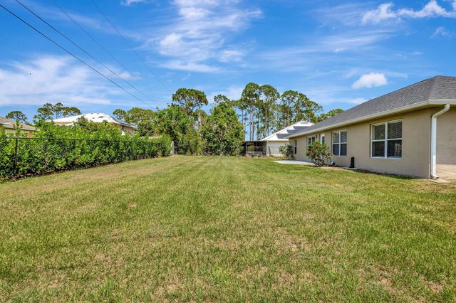 1897 SW Lofgren Avenue, Port St Lucie, FL 34953