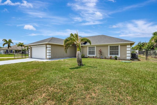 1897 SW Lofgren Avenue, Port St Lucie, FL 34953