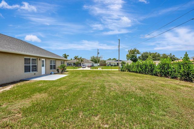 1897 SW Lofgren Avenue, Port St Lucie, FL 34953