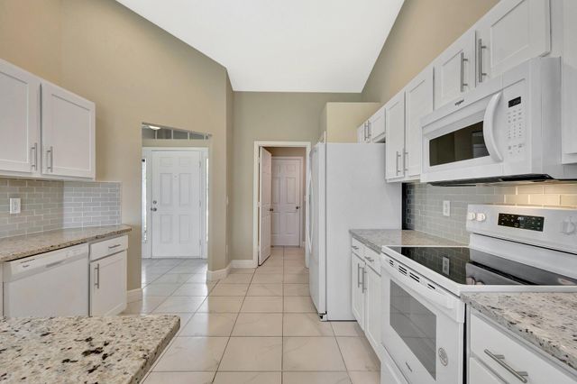 1897 SW Lofgren Avenue, Port St Lucie, FL 34953