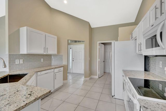 1897 SW Lofgren Avenue, Port St Lucie, FL 34953