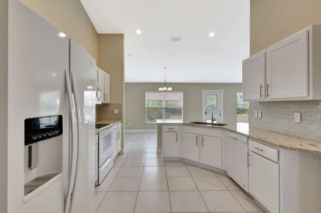 1897 SW Lofgren Avenue, Port St Lucie, FL 34953
