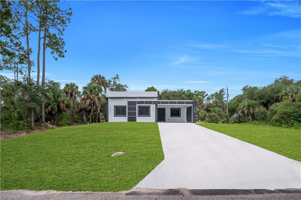 3304 E 15th ST, LEHIGH ACRES, FL 33972 — photo 4