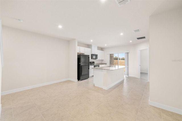 1197 PORT BLUE WAY, Lady Lake, FL 32159