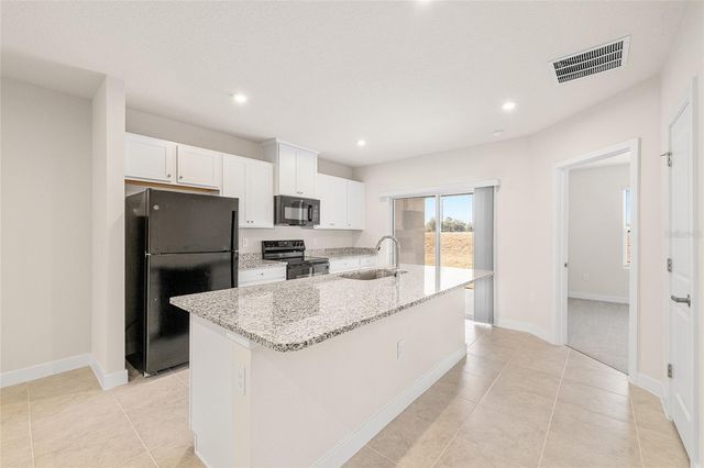 1197 PORT BLUE WAY, Lady Lake, FL 32159