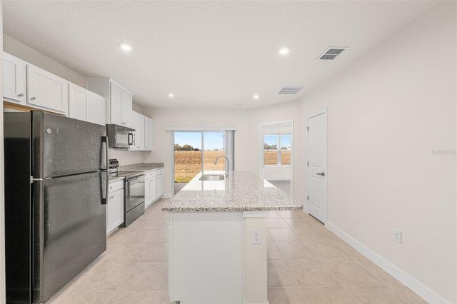 1197 PORT BLUE WAY, Lady Lake, FL 32159