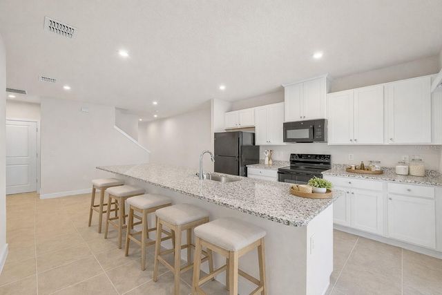 1197 PORT BLUE WAY, Lady Lake, FL 32159