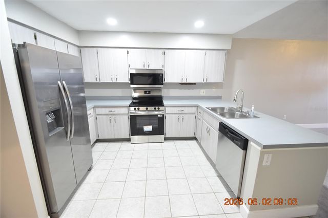23223 CLUB VILLAS DRIVE 23223, Land O Lakes, FL 34639