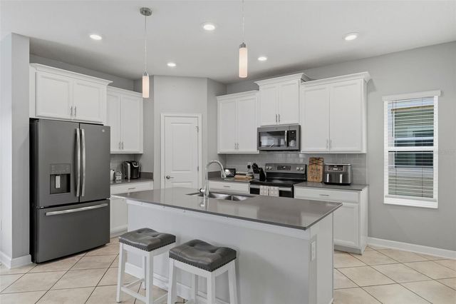 1099 TRAPPERS TRAIL LOOP, Davenport, FL 33896