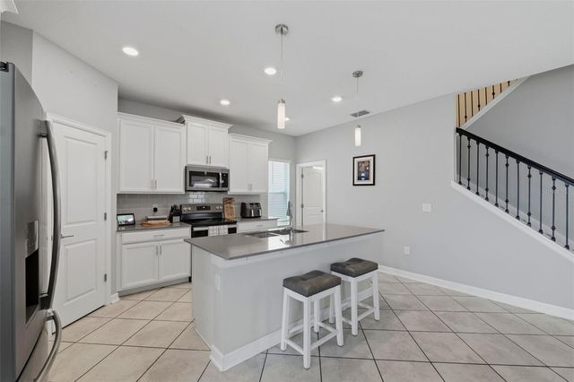 1099 TRAPPERS TRAIL LOOP, Davenport, FL 33896