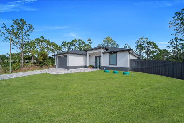 1112 Clark Avenue, Lehigh Acres, FL 33972