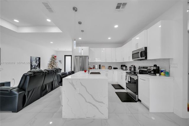 1112 Clark Avenue, Lehigh Acres, FL 33972