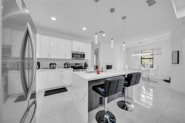 1112 Clark Avenue, Lehigh Acres, FL 33972