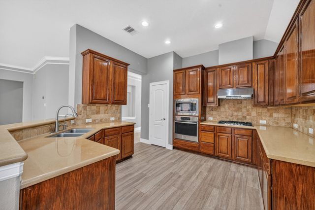 15211 Waverly Canyon Court, Cypress, TX 77429