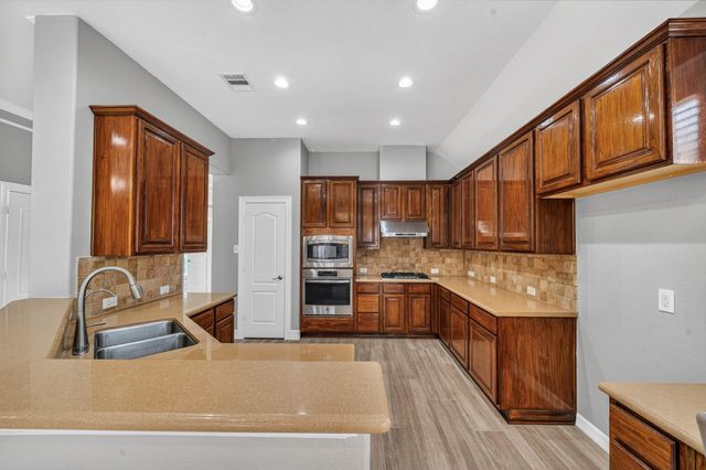 15211 Waverly Canyon Court, Cypress, TX 77429