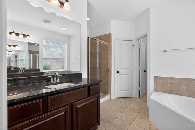 74 N Whistling Swan Place, Spring, TX 77389