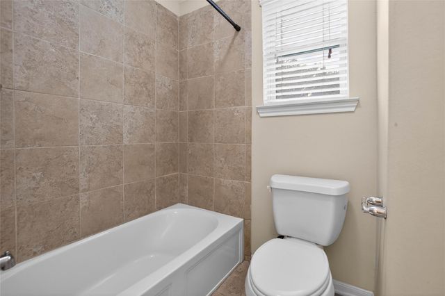 74 N Whistling Swan Place, Spring, TX 77389