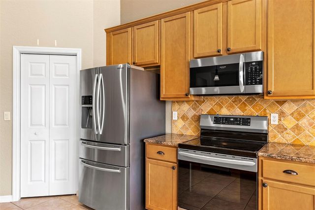 9703 SPRING LAKE DRIVE, Clermont, FL 34711