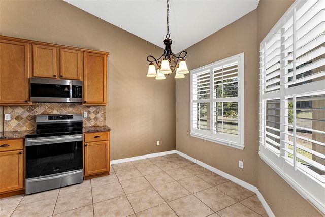 9703 SPRING LAKE DRIVE, Clermont, FL 34711