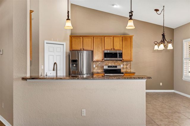 9703 SPRING LAKE DRIVE, Clermont, FL 34711