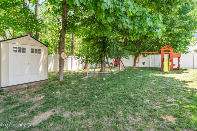 135 Woodcliff Boulevard, Morganville, NJ 07751