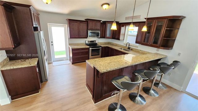 14249 SW 90th Ter, Miami, FL 33186