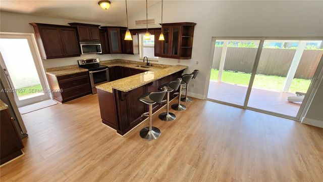 14249 SW 90th Ter, Miami, FL 33186