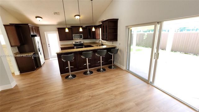 14249 SW 90th Ter, Miami, FL 33186
