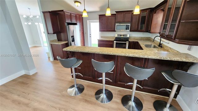 14249 SW 90th Ter, Miami, FL 33186