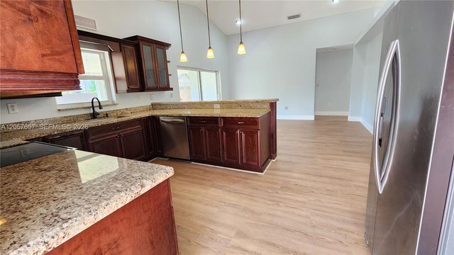 14249 SW 90th Ter, Miami, FL 33186